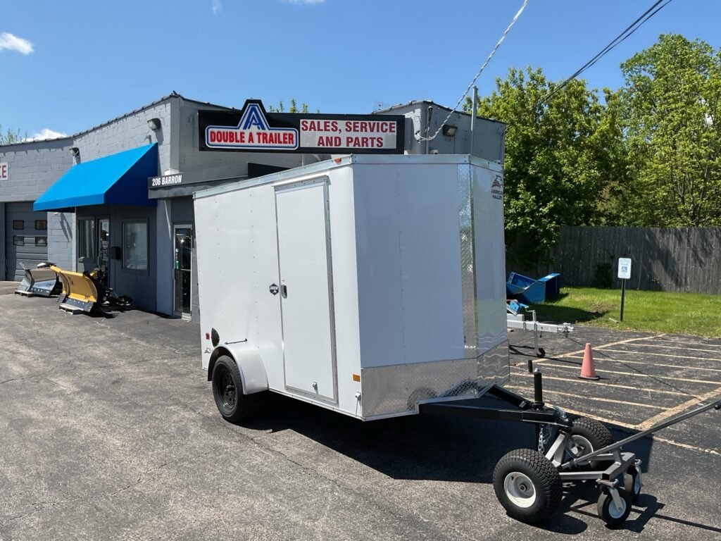 2025 AMERICAN HAULER ARROW DELUXE 6′ X 10′ WITH 6′ 6″ INTERIOR HEIGHT CARGO / ENCLOSED TRAILER